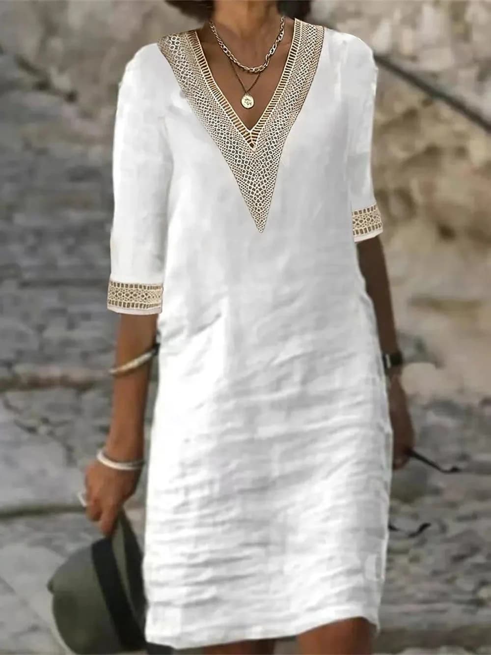 Nuevo vestido elegante de manga media con cuello en V de color sólido